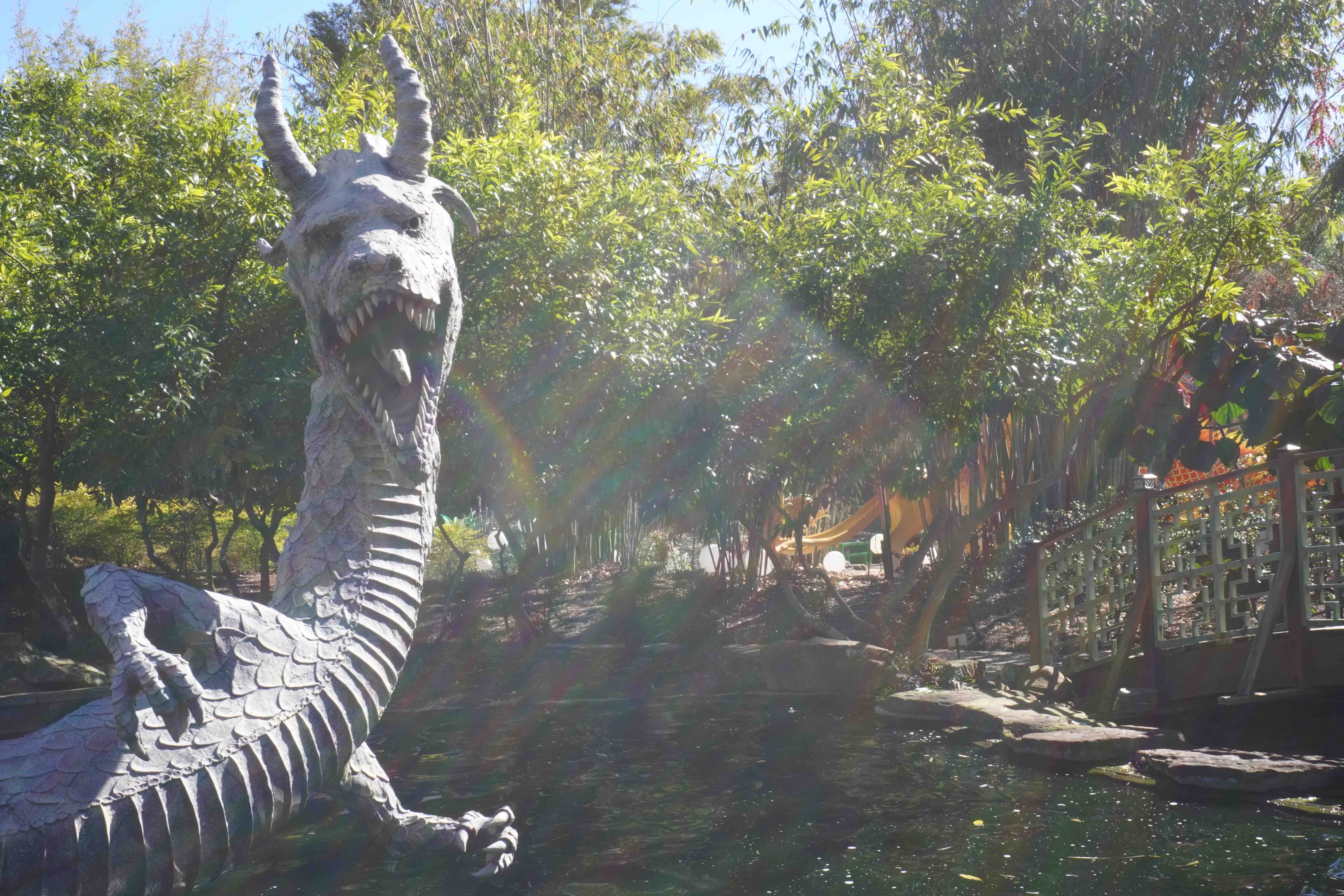 Elegant graffiti art of a Japanese woman catching a rose petal.